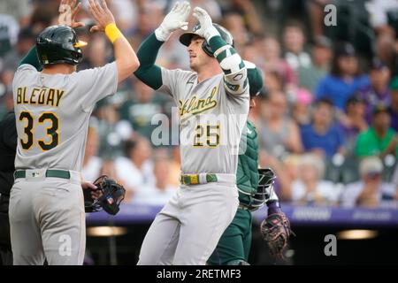 Oakland Athletics' JJ Bleday (33) is congratulated by third base