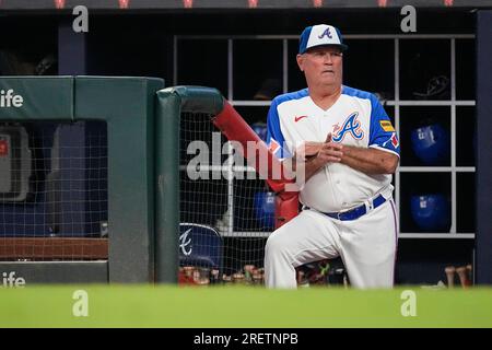 Atlanta Braves manager Brian Snitker watches from the dugout during the  team's baseball game against the