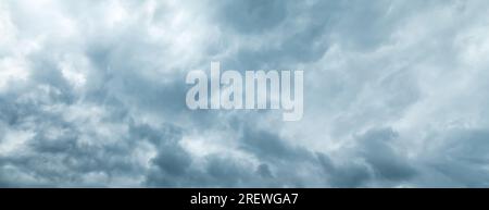 Sky. Dark stormy sky panorama, thunderstorm and hurricane, clouds background. Sky banner Stock Photo