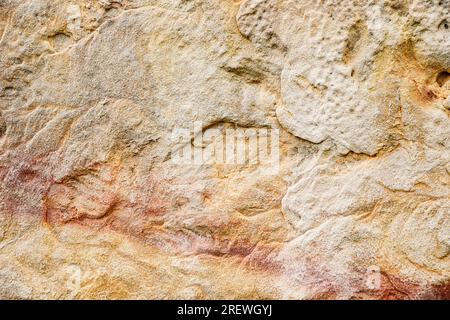 Stone background texture. Old aged beige stone wall or floor, rock pattern Stock Photo