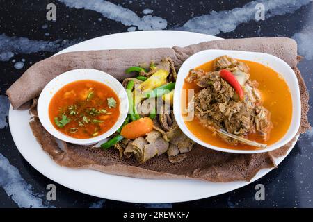 Nyama Choma Sukuma wiki Pilau Ugali Chapati Githeri Mandazi Mukimo Matoke Mutura Ugali popular foods in kenya IRIO Wali wa nazi (coconut rice) Chips m Stock Photo