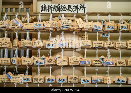 July 2023, Ise, Mie Prefecture. Wooden wishes plaque (Ema) at Futami Okitama Shrine Stock Photo