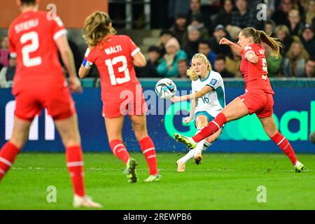 Dunedin, New Zealand. 30th July, 2023. Jacqui Hand (2nd R) of New Zealand shoots the ball during the group A match between Switzerland and New Zealand at the 2023 FIFA Women's World Cup in Dunedin, New Zealand, July 30, 2023. Credit: Zhu Wei/Xinhua/Alamy Live News Stock Photo