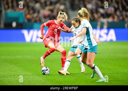 Dunedin, New Zealand. 30th July, 2023. Ana Maria Crnogorcevic (L) of Switzerland vies with Ria Percival (C) of New Zealand during the group A match between Switzerland and New Zealand at the 2023 FIFA Women's World Cup in Dunedin, New Zealand, July 30, 2023. Credit: Zhu Wei/Xinhua/Alamy Live News Stock Photo