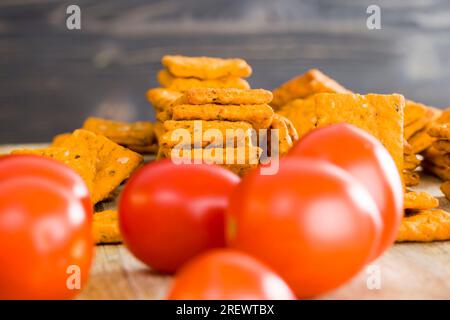 wheat crackers with the addition of dried vegetables and spices, healthy dietary foods rich in minerals, vitamins and fiber, Stock Photo
