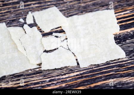 long thin potato chips made from natural grated potatoes with added spices, a large plan of high calorie and unhealthy food Stock Photo