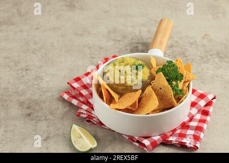 Mexican Nachos Tortilla Chips with Avocado Dips Guacamole Stock Photo