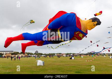 Portsmouth, Hampshire UK. 30th July 2023. Miserable grey and drizzly weather doesn't deter visitors from going to Southsea Common for the Portsmouth International Kite Festival, one of the biggest kite festivals in the world. An amazing assortment of kites and displays with kite fliers from all parts of the UK and the world.  Credit: Carolyn Jenkins/Alamy Live News Stock Photo