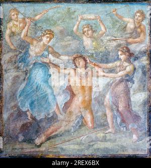 Pompeii Archaeological Site, Campania, Italy.  Fresco illustrating the death of Pentheus from the Greek myth.  House of the Vettii.  Casa dei Vettii. Stock Photo