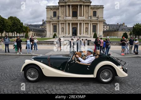 Paris, France. 30th July, 2023. Participants drive with their vehicles during the parade of the 16th “Traversee de Paris” in vintage vehicles in Paris, France, on July 30, 2023. Photo by Firas Abdullah/ABACAPRESS.COM Credit: Abaca Press/Alamy Live News Stock Photo