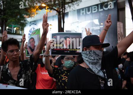 Bangkok, Thailand. 29th July, 2023. Protesters, showing messages against Senate members, and some holding up a three-finger gesture, at a rally in Ratchaprasong intersection, Ratchadamri road. (Photo by Teera Noisakran/Pacific Press/Sipa USA) Credit: Sipa USA/Alamy Live News Stock Photo