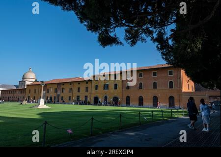 The long Campo Santo, also known as Camposanto Monumentale or Camposanto Vecchio, is a historical building behind the Cathedral on the Plazza Del Duomo Stock Photo
