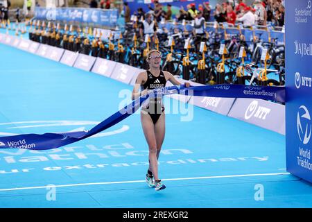 Team France’s Cassandre Beaugrand crosses the line to win the Mixed ...