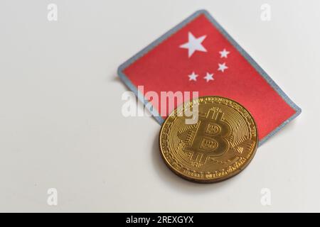 Bitcoins over chinese flag. Bitcoin ban in China concept. Stock Photo