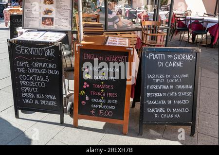English breakfast served to UK visitors on Via Santa Maria near the Leaning Tower complex in Pisa in the Tuscany region of Italy Stock Photo