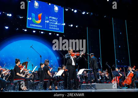 Chengdu, China's Sichuan Province. 30th July, 2023. Musicians play during the concert Dreams of Midsummer at the 31st FISU Summer World University Games Village in Chengdu, southwest China's Sichuan Province, July 30, 2023. Credit: Shen Bohan/Xinhua/Alamy Live News Stock Photo