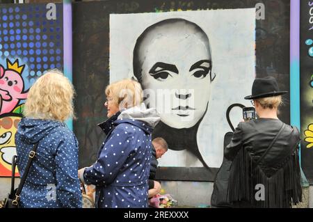 Limerick city, Ireland. 30th July, 2023.A large crowd gathered in Arthur's Quay this sunday to make a tribute on the passing of Irish singer songwriter Sinéad O'Connor. Credit: Karlis Dzjamko/Alamy Live News Stock Photo