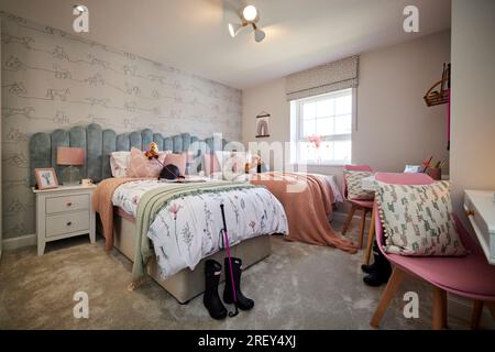Girls pink horse themed  bedroom at a show home in Macclesfield Stock Photo