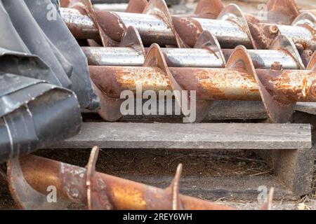 Scrap parts Blending machine screws outside weather rusty. High quality photo Stock Photo