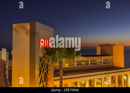 Close up exterior view of RIU Vistamar hotel of Gran Canaria on sunset sky background. Spain. Gran Canaria. Stock Photo