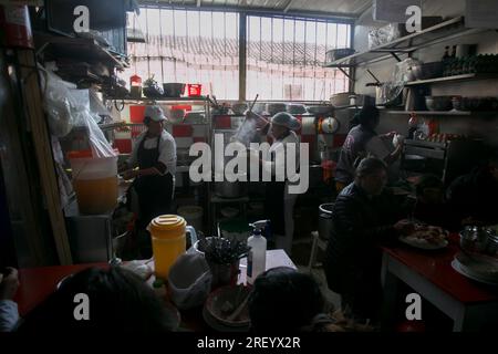 Cusco, Peru; 1st January 2023: Restaurant serving traditional 'Caldo de Gallina' in San Pedro Market in Cusco. Stock Photo