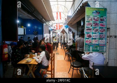 Lima, Peru; 1st January 2023: Restaurant in the Surquillo market in Lima, Peru. Stock Photo