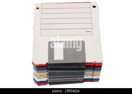 Colored old retro floppy diskettes in stack. Isolated on white background. Stock Photo