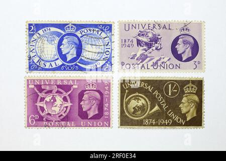 George VI stamps issue of 1949 to commemorate the 75th anniversary of the postal union. British postage stamp collecting hobby Stock Photo