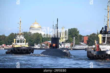 St Petersburg, Russia. 30th July, 2023. The Ufa diesel-electric submarine sails during the Russian Navy Day parade in the Gulf of Finland, July 30, 2023 in St. Petersburg, Russia. Credit: Alexander Kazakov/Kremlin Pool/Alamy Live News Stock Photo