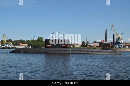 St Petersburg, Russia. 30th July, 2023. The Ufa diesel-electric submarine sails during the Russian Navy Day parade in the Gulf of Finland, July 30, 2023 in St. Petersburg, Russia. Credit: Alexander Kazakov/Kremlin Pool/Alamy Live News Stock Photo