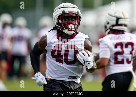 Washington Commanders running back Alex Armah (40) runs during an NFL  preseason football game against the Cincinnati Bengals, Saturday, August  26, 2023 in Landover. (AP Photo/Daniel Kucin Jr Stock Photo - Alamy