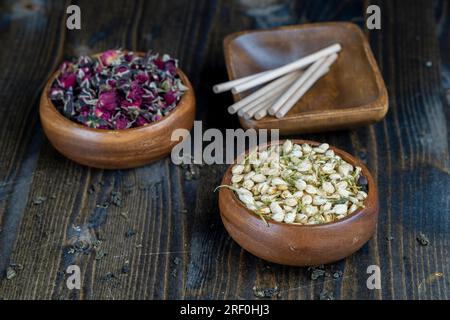 dried rose flowers to dried tea leaves, ready for making green tea dried high-quality tea leaves Stock Photo