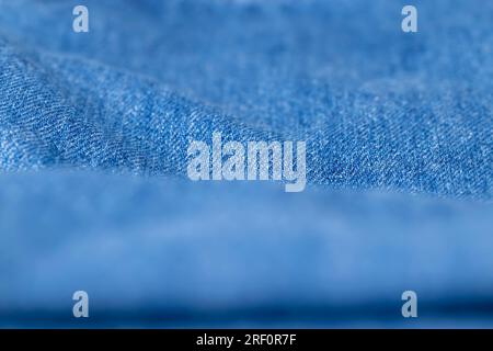 close-up of a new blue denim fabric, part of a pair of blue denim pants Stock Photo