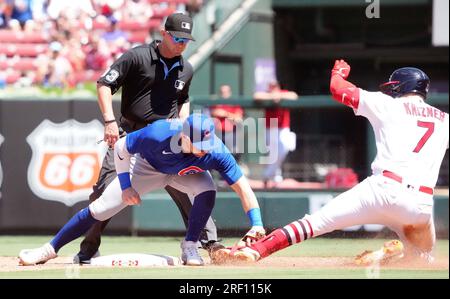 St. Louis, United States. 30th July, 2023. St. Louis Cardinals Andrew Knizner is tagged out at second base by Chicago Cubs Nico Hoerner as he tries to stretch a single into a double in the fourth inning at Busch Stadium in St. Louis on Sunday, July 30, 2023. Calling the play is umpire Will Little. Photo by Bill Greenblatt/UPI Credit: UPI/Alamy Live News Stock Photo