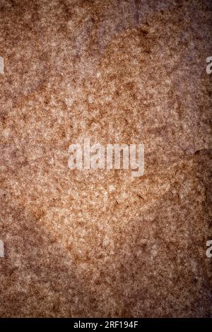 Brown abstract background from a sheet of craft paper Stock Photo