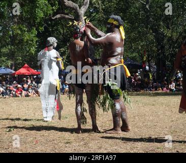 Dancers from Yarrabah including one in white crocodile skin, Lauran Quinkan Dance Festival, Cape York Peninsula, 2023. No MR or PR Stock Photo