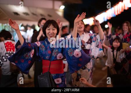 Man in yukata dancing at an o-bon festival for the dead in Japan Stock  Photo - Alamy