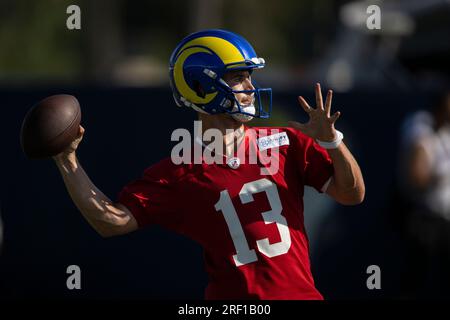 Los Angeles Rams quarterback Stetson Bennett (13) passes the ball during an  NFL preseason game. The Chargers defeated the Rams 34-17 on Saturday, Aug  12, 2023 in Inglewood, Calif. (Ed Ruvalcaba/Image of