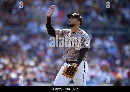 San Diego Padres' Robert Suarez makes a gesture during a baseball game  against the Los Angeles Dodgers, Saturday, April 23, 2022, in San Diego.  (AP Photo/Derrick Tuskan Stock Photo - Alamy