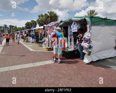 Tourists browsing a market in Curacao on a dry and bright winters day Stock Photo