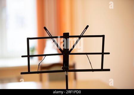 Empty music stand for wind instruments. Stock Photo
