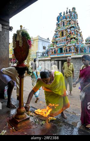 A Devotee Worshipping Vel Spear At Hilltop In Lord Murugan Temple At ...