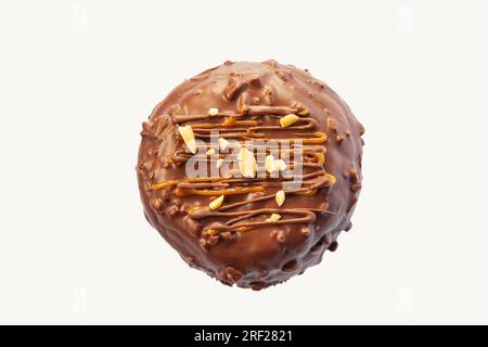Chocolate and nuts brioche doughnut isolated and clip masked on a white background. Stock Photo