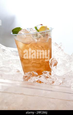 Fresh ice tea in plastic cup Stock Photo - Alamy