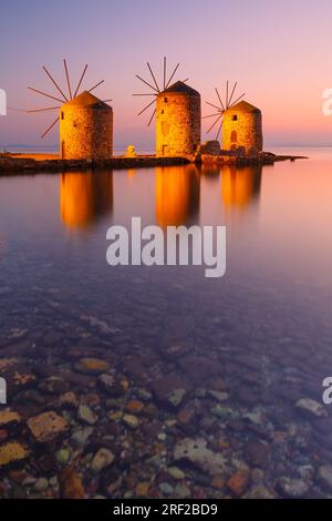 Sunrise image of the iconic windmills in Chios town. Stock Photo