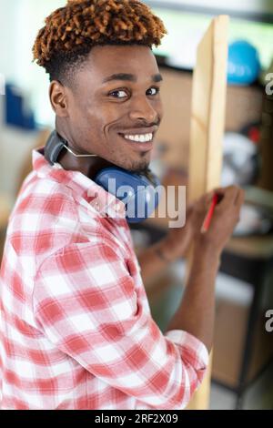 happy worker smiling at the camera Stock Photo