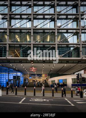 London, UK: Cannon Street railway station in the City of London. The entrance on Cannon Street with people outside. Portrait view. Stock Photo