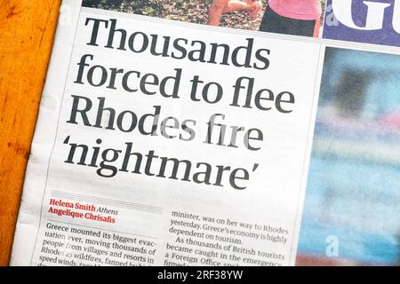 'Thousands forced to flee Rhodes fire 'nightmare' Guardian newspaper headline front page Greece wildfires tourism article on 24 July 2023  London UK Stock Photo