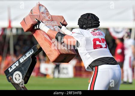 Tampa Bay Buccaneers guard Luke Goedeke (67) pushes a blocking