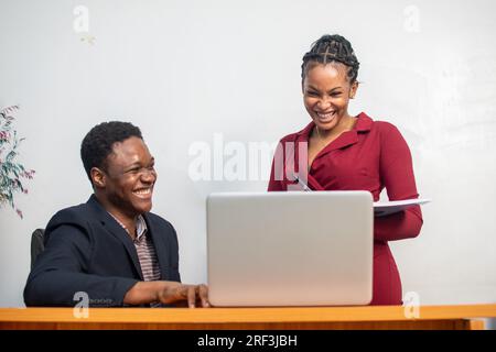 two african employees working together on a project Stock Photo